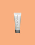 Mini Sutil Coconut Flavored Lube displayed over an orange background