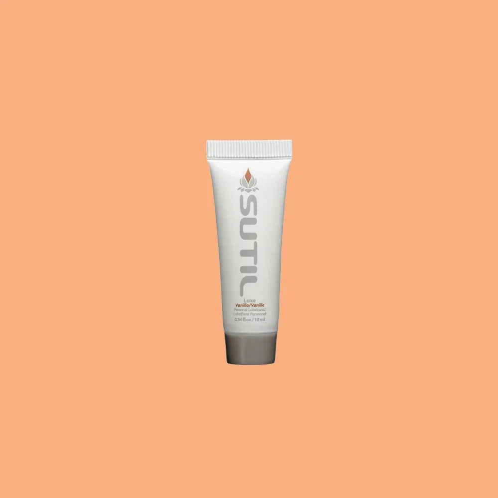 Mini Sutil Vanilla Flavored Lube displayed over an orange background