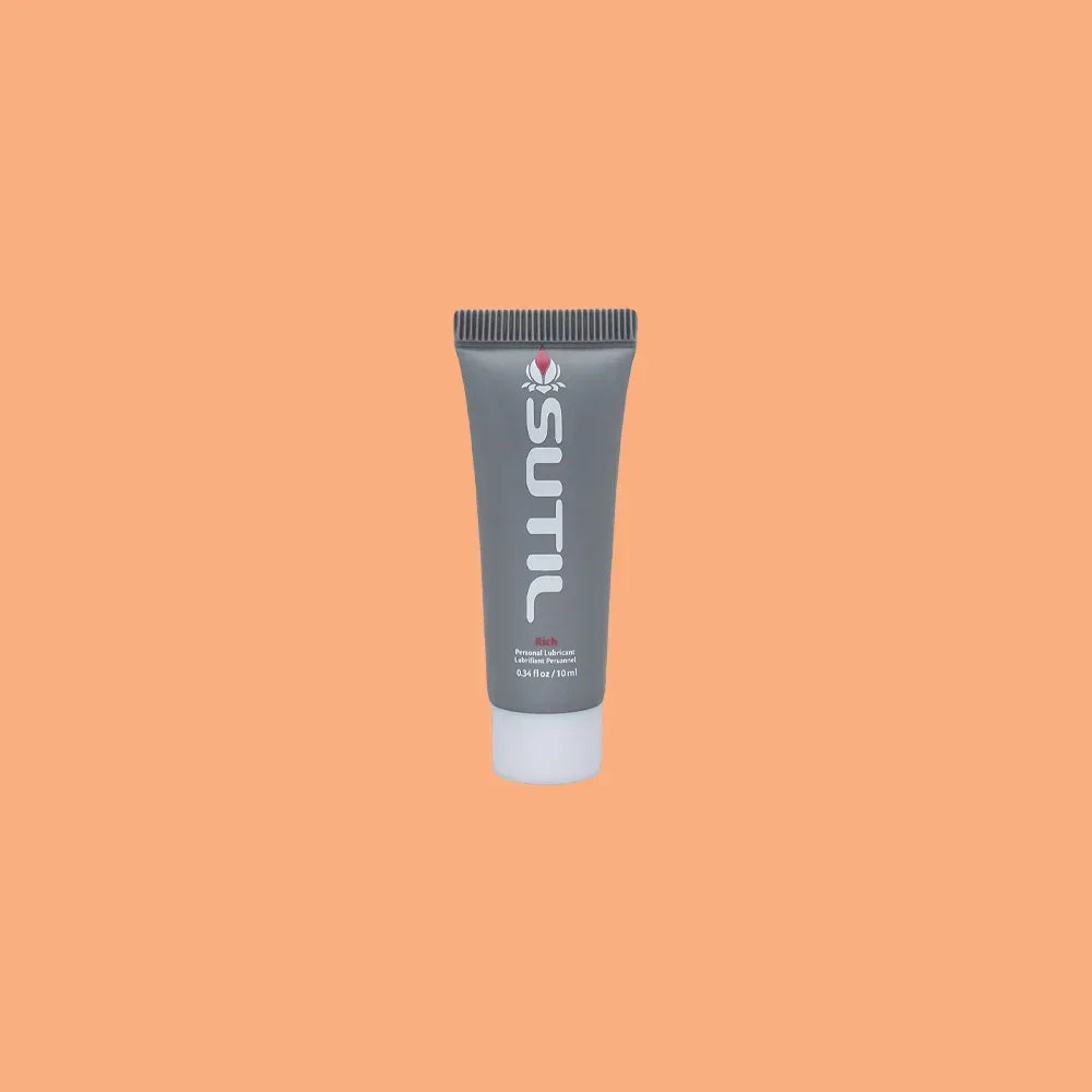 Mini Sutil Rich Lube displayed over an orange background
