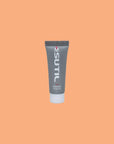 Mini Sutil Rich Lube displayed over an orange background