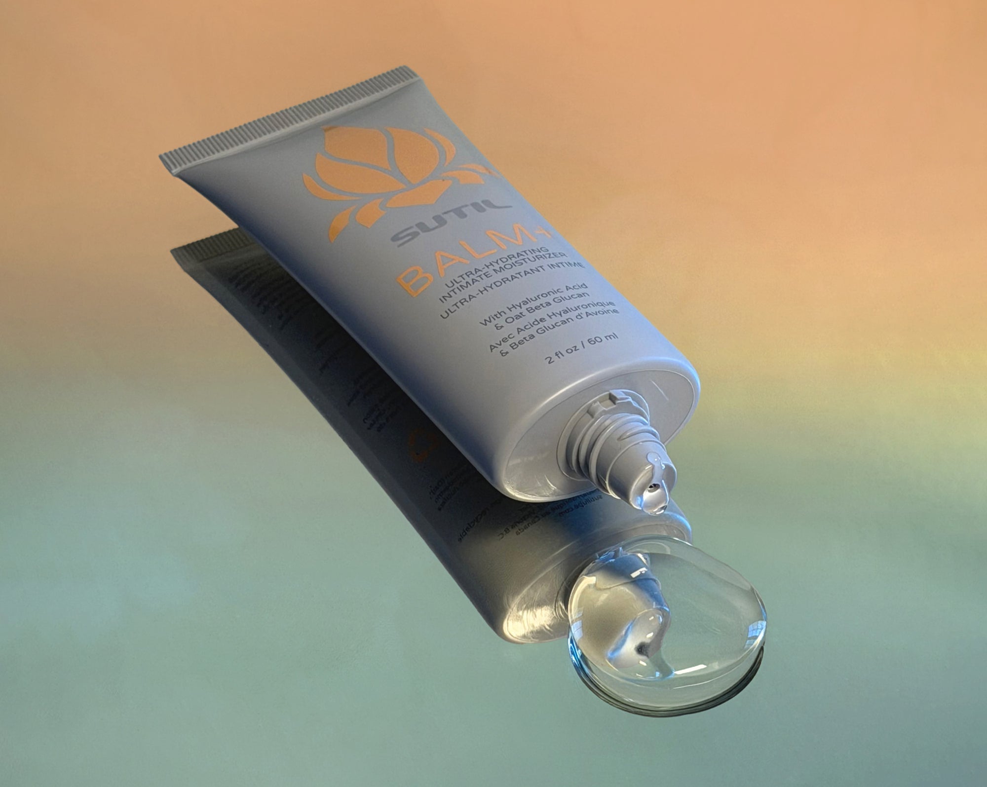 Tube of balm plus with a droplet on a gradient background