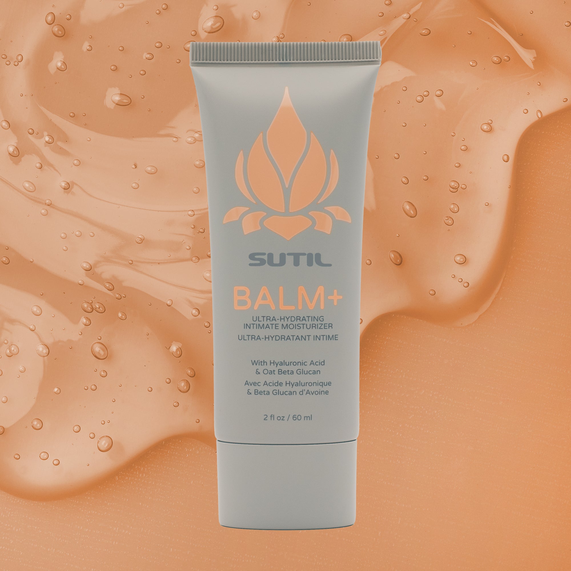 SUTIL Balm+ tube on an orange textured background