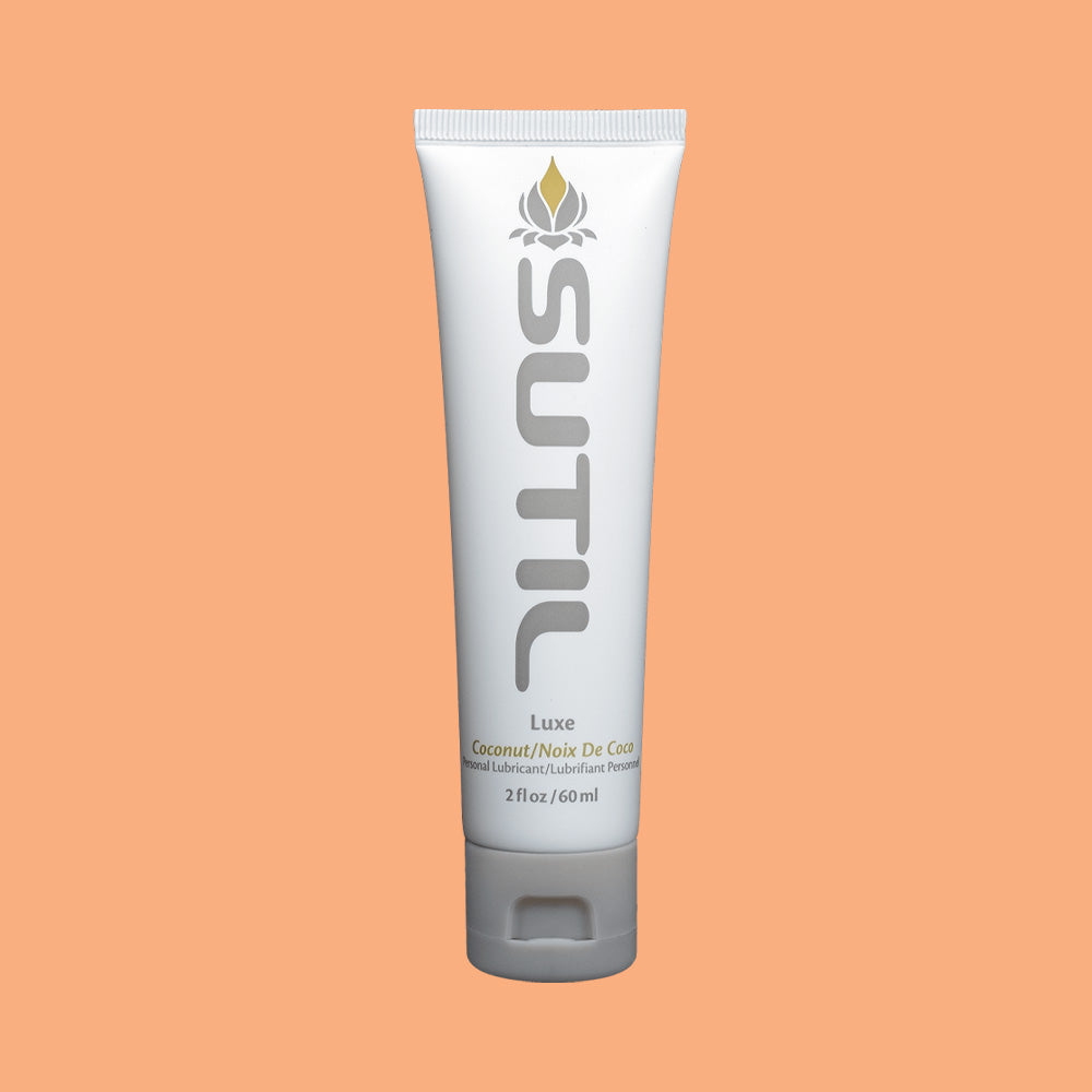Sutil Flavor Coconut lube on an orange background