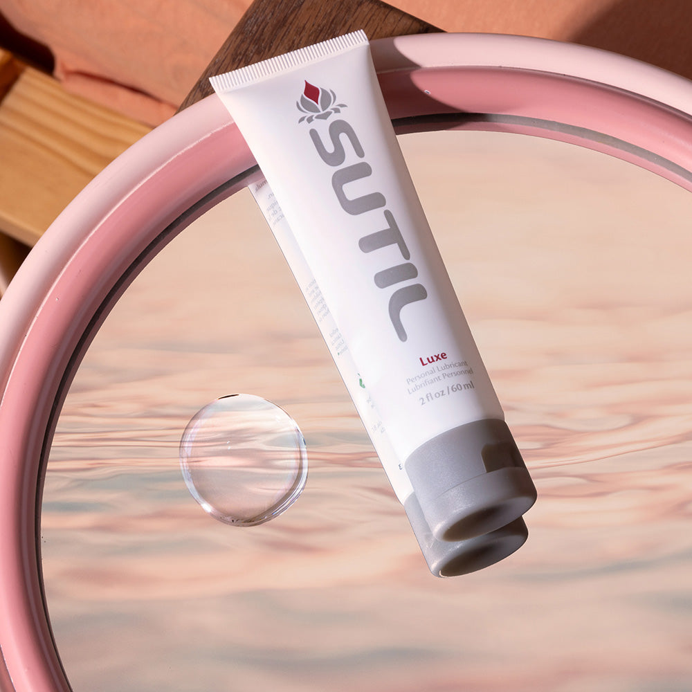 Sutil Luxe lube displayed on a mirror